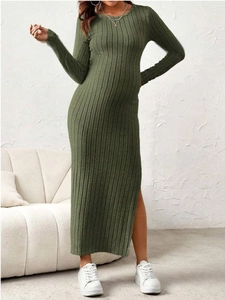 Detail of army green ribbed knit maternity dress with a side slit and slim fit