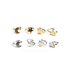8-piece set of gold and silver U-shaped ear cuffs with moon, star, and heart shapes