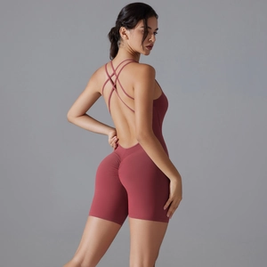 Detail of cross-back straps and scrunch butt design on high-stretch yoga bodysuit