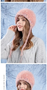 Detailed close-up of pink plush knit beanie with textured faux fur and winter vibes