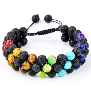 Macro shot of double-layer volcanic rock beads and seven chakra stones on adjustable cord
