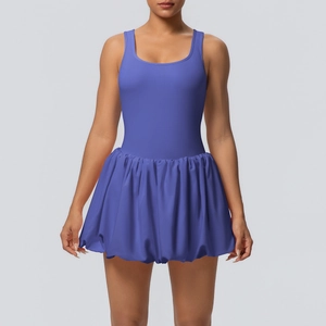 Detail of royal blue athletic dress featuring a u-neck bodice and puffy balloon hem skirt