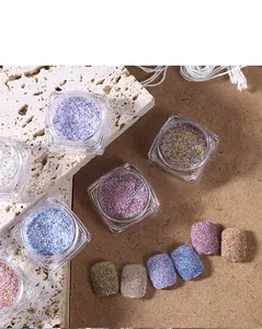 Macro detail of 6-color nail art glitter sand powder set with textured matte finish effect
