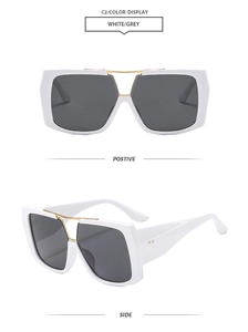 Detail of white pilot sunglasses with grey lenses and gold double bridge structure
