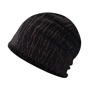 Detail of black knit beanie featuring wavy multi-color glitter thread and ribbed texture