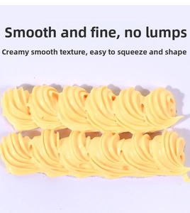 Macro shot of smooth pale yellow simulation cream clay with detailed wavy textures