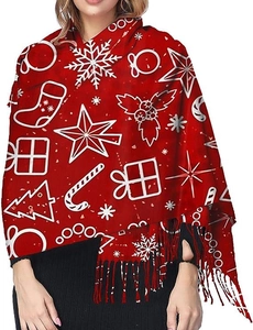 Detail of red Christmas scarf with white snowflake patterns and elegant fringe trim