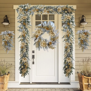 Detail of flocked Christmas garland and wreath set with silver poinsettia flowers