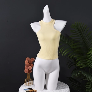 Detail of light yellow halter knit ribbed tank top shown on a white mannequin