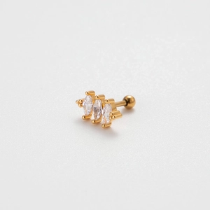 Detailed macro view of gold screw-back stud earring with three marquise-cut zircons