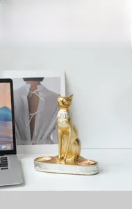 Portacandele con statuetta di gatto egiziano Bastet dorato con antichi geroglifici