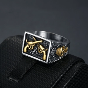 Gothic punk men's stainless steel ring featuring golden revolvers and skull embossing