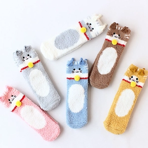 Five pairs of coral fleece cat socks in assorted colors with 3D ears and small bells