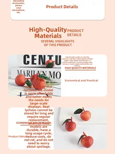 Realistic 1:1 scale faux litchi model with textured red skin and green leaves detail