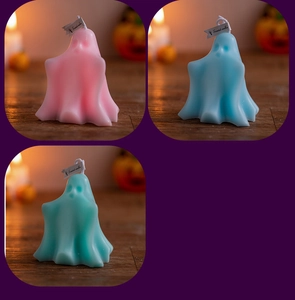 Three colorful ghost shaped scented candles in pink, blue and teal for Halloween decor