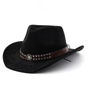 Close-up of black suede cowboy hat with brown leather band and silver metal studs