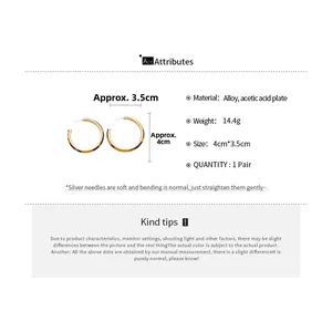 Detail showing vintage leopard print C-shape hoop earrings dimensions 4cm x 3.5cm