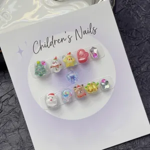 Kids Christmas press-on nails with 3D Santa and reindeer designs on black background