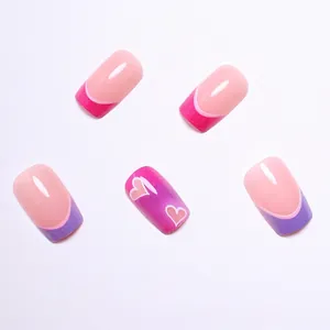 Barbie pink and purple French press-on nails with heart patterns and glossy finish