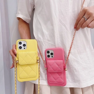 Quilted crossbody phone case with card holder and gold chain in pink and yellow colors