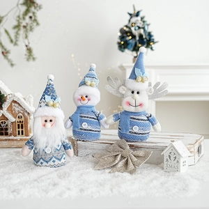 Blue and grey knitted Christmas figurines of Santa, Snowman and Reindeer for home decor