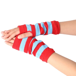Detailed view of red and blue striped knitted fingerless arm warmers on hands