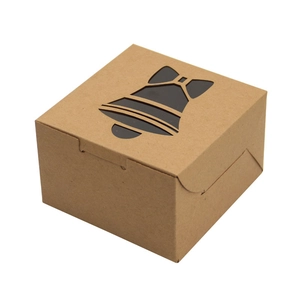 Kraft paper Christmas gift box with bell-shaped window cutout on white background