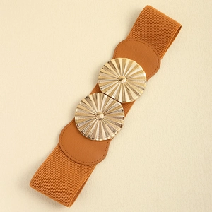 Close-up of brown elastic waist belt with gold metal buckles and leather texture detail