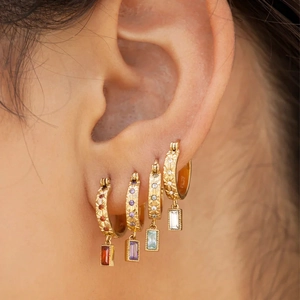 Detail of S925 silver gold-plated hoop earrings with colorful rectangular zircon stones
