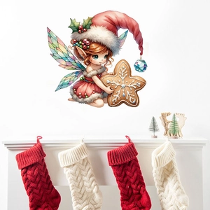 Detail of Christmas fairy wall sticker with gingerbread star on white fireplace background