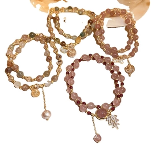 Bohemian multi-layer bracelet set with pink crystals, freshwater pearls and gold charms
