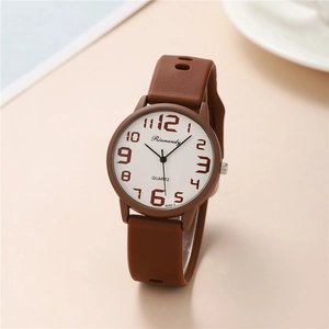 Macro shot of Rinnandy quartz watch dial with brown numerals and silicone strap details