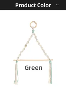 Close-up of Nordic woven wall hanger with cotton rope spiral pattern and wood rod detail