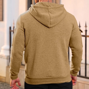 Outdoor back view of men's khaki fleece hoodie featuring shoulder zipper pocket detail