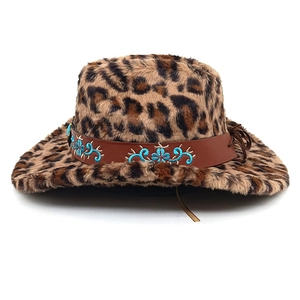 Detail of leopard print faux fur cowboy hat with embroidered leather band and turquoise studs