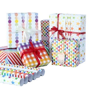 Colorful gift wrapping paper with rainbow dots, stars, and geometric patterns for birthdays