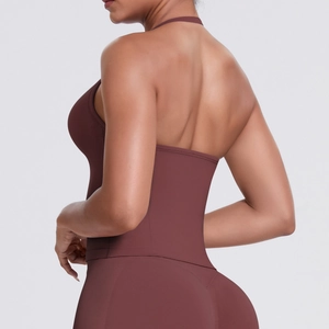 Detail view of backless halter yoga top and high waist leggings in dark coffee brown