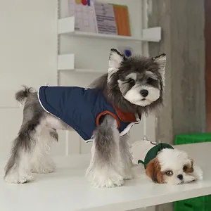 Quilted pet winter vest in navy blue and cream white color options with a stylish collar