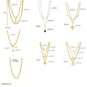Set of layered gold stainless steel necklaces with butterfly moon and pearl pendants