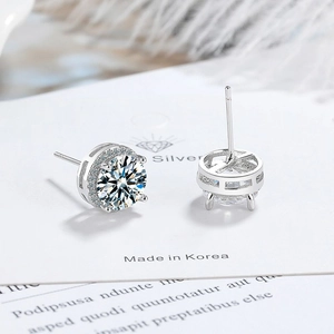 Sparkling silver princess round cut cubic zirconia stud earrings with halo accents