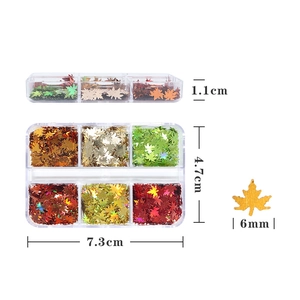 Detail view of 6mm maple leaf nail glitters in a 6-grid box with specific size dimensions