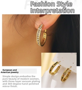 Detail of gold-plated hoop earrings featuring micro-pave white and colorful cubic zirconia