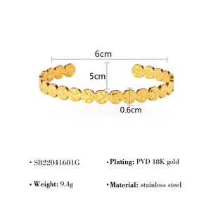 Irregular hammered gold stainless steel open bangle with circular texture for women