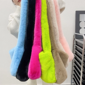 Close-up of fluffy faux fur crossbody bags in multiple vibrant Y2K colors