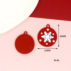 Detailed view of a red Christmas snowflake pendant with dimensions 26mm by 22mm