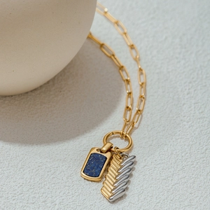 18K gold plated necklace featuring blue lapis lazuli and bicolored textured metal pendants