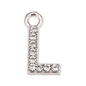 Close-up of silver alloy L-letter pendant with sparkling white rhinestones and top ring