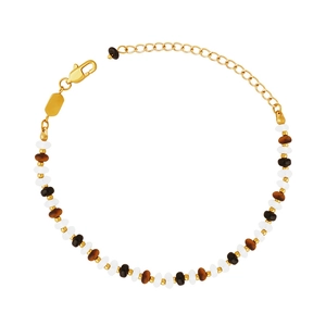 Bracelet style Bali avec perles blanches, œil de tigre et noires sur chaîne dorée
