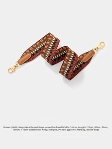 Detail of 3.8cm wide brown woven strap with gold hardware and leather ends