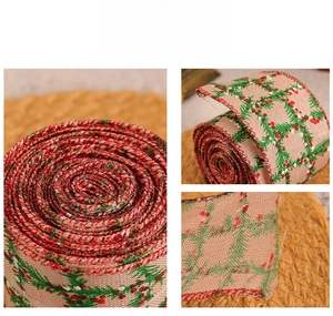 Macro detail of red and green plaid Christmas ribbon with durable imitation linen texture